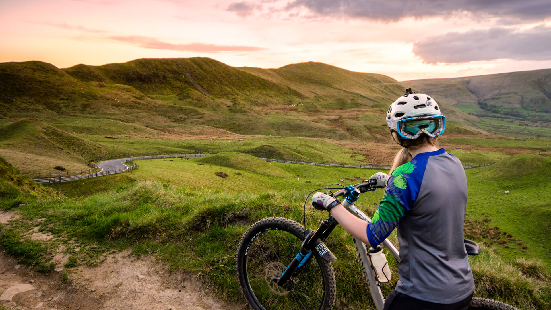 Girl on a mountain bike in the Peak District hills